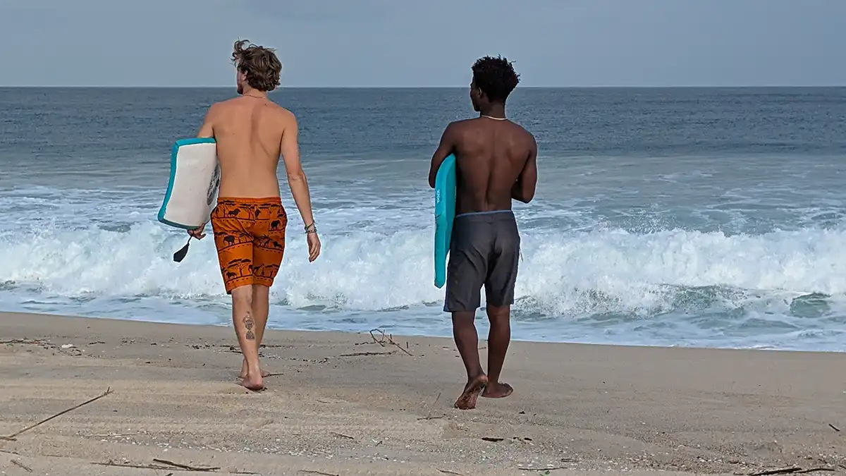 Entering The Ocean To Body Board